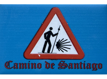 Badge aimanté avec signe de pèlerin
