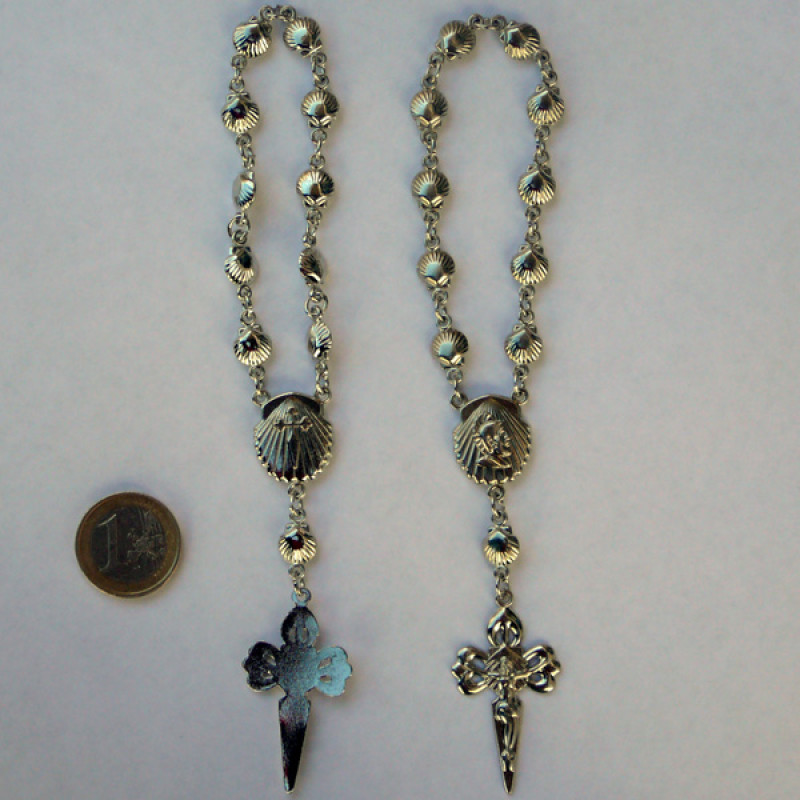 Poupée métallique miniature