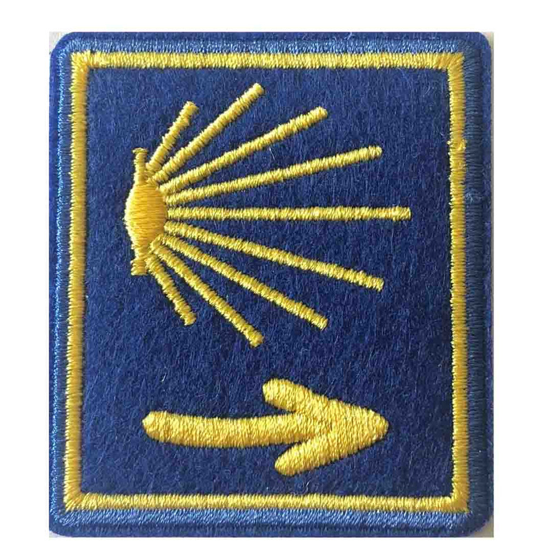 Étoile de parche brodée et chemin de flèche